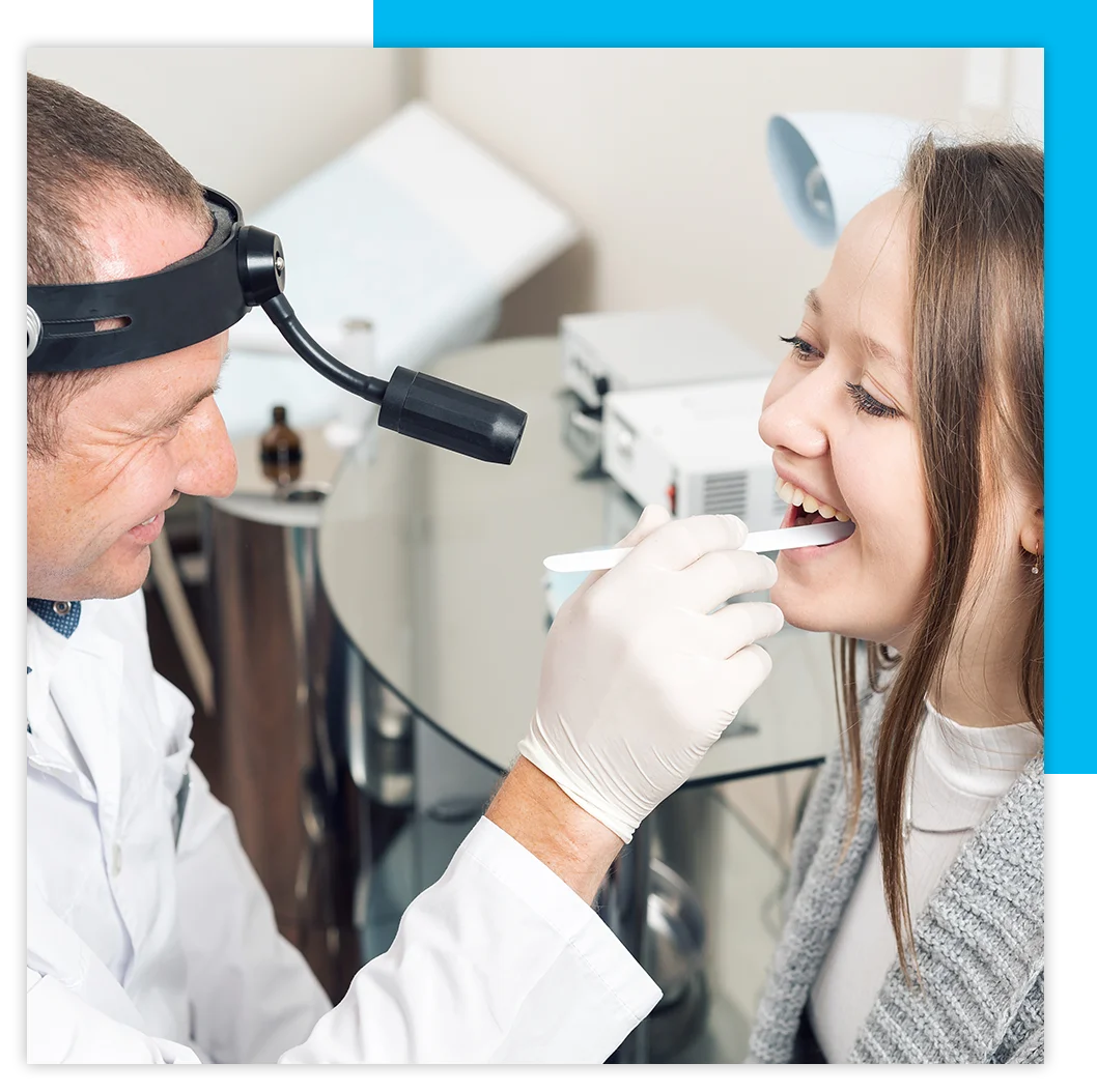 ENT doctor examining patient