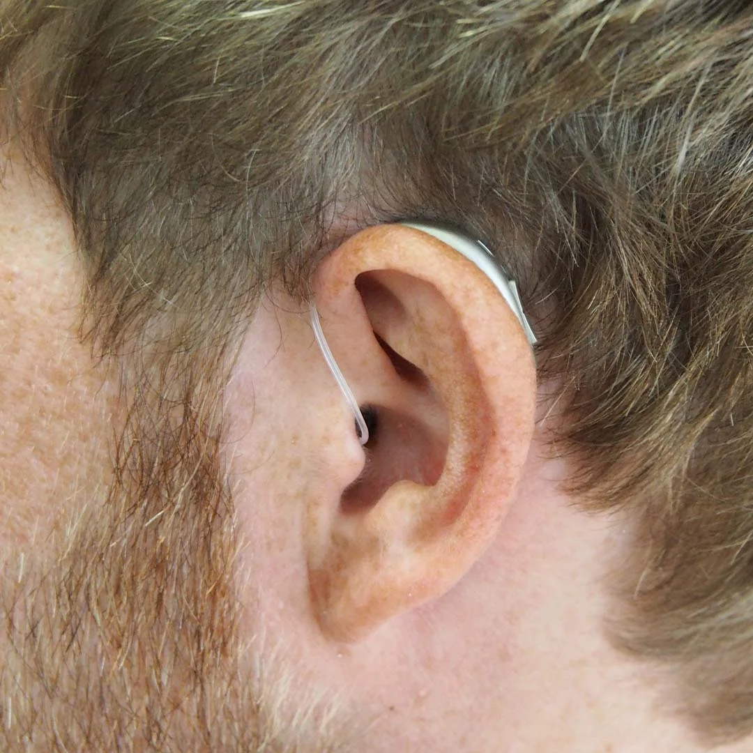 Man with hearing aids