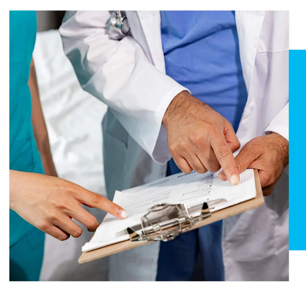 A patient talking with a doctor.