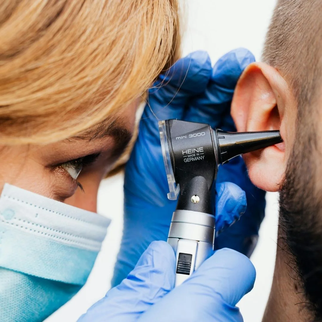 ENT looking in ear