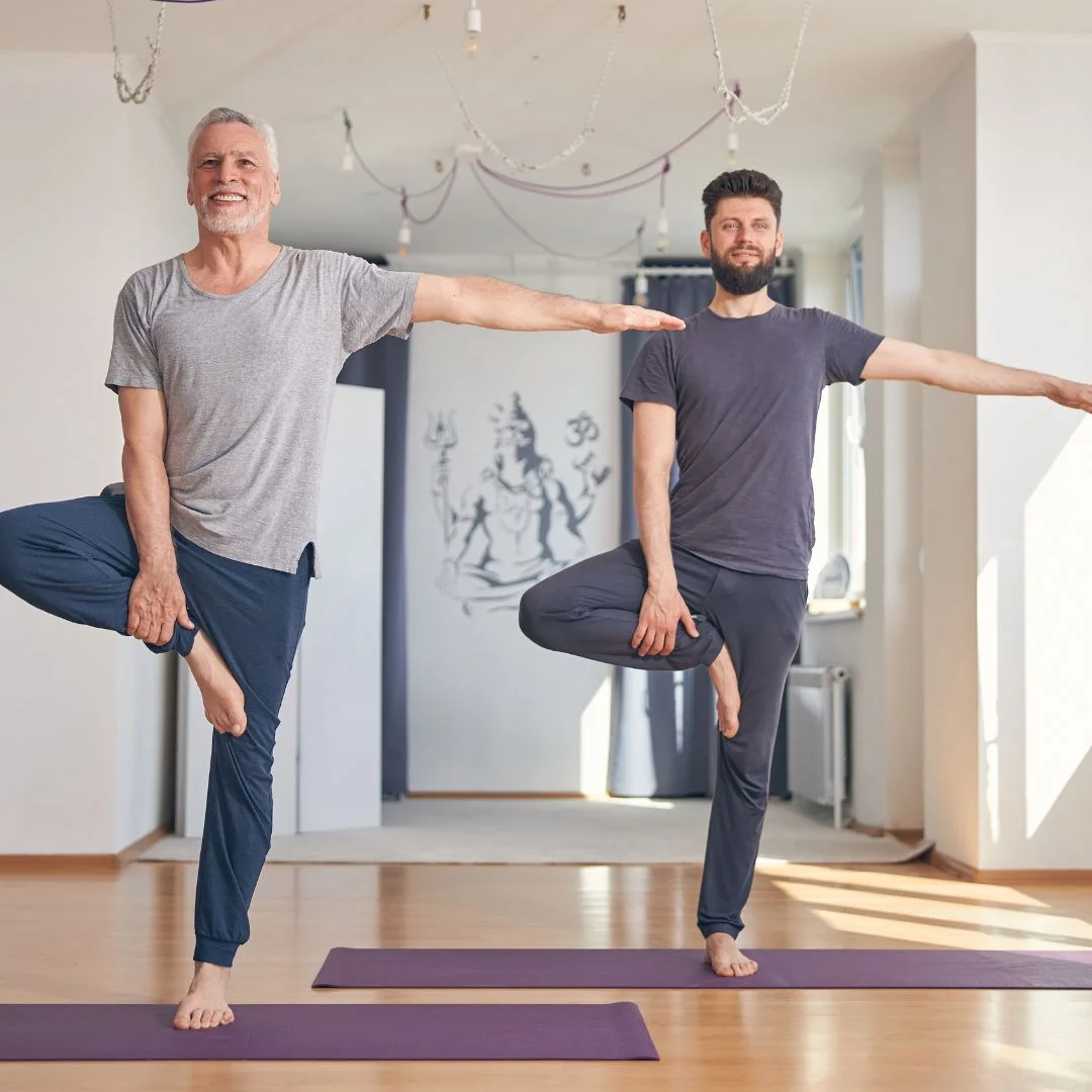 two men doing yoga