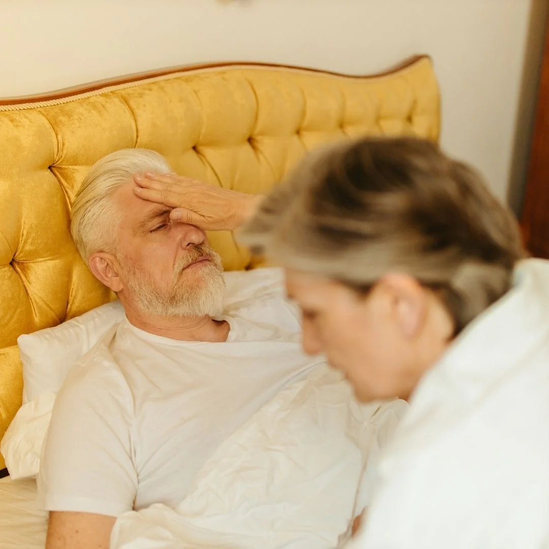 man sick in bed