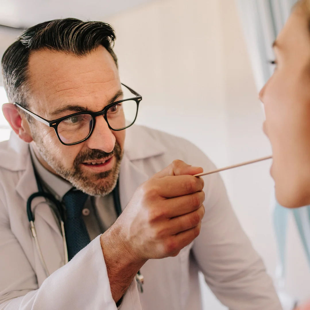 Doctor performing an examination on a patient.