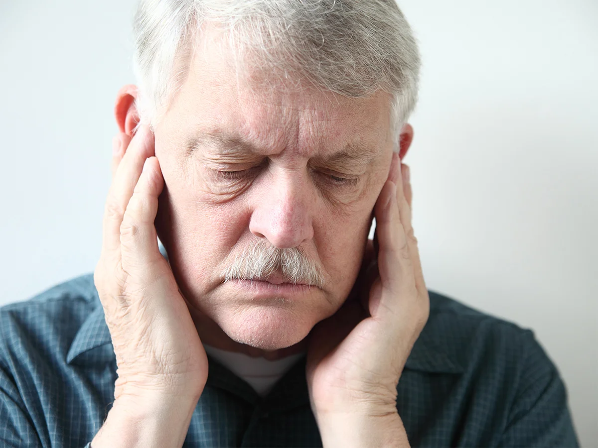 elderly person with earache